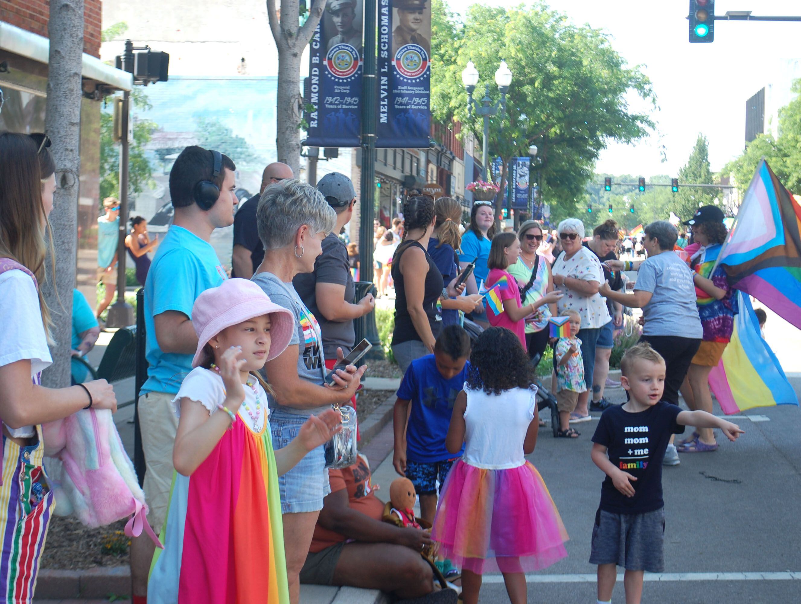 Spectators line La Salle Street in downtown Ottawa for the inaugural John Fisher Dann Memorial Pride Parade on Saturday, June 10, 2023.