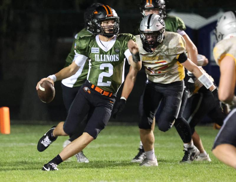 DeKalb's Cole Latimer is flushed out of the pocket by the Kanland pass rush during their game Friday, Sept. 13, 2024, at Kaneland High School in Maple Park.