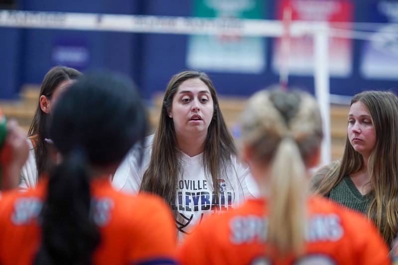 Romeoville's head coach Paige Reinert talks to her team during a break in play during a volleyball game against Oswego at Oswego High School on Tuesday, Oct. 17, 2023.