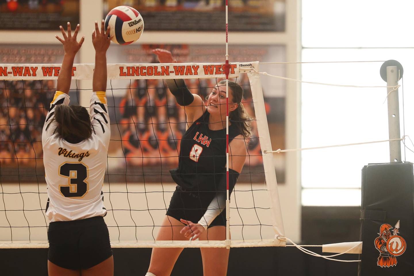 Lincoln-Way West’s Elly Decker powers a shot against St. Laurence on Monday, August 26, 2024 in New Lenox.