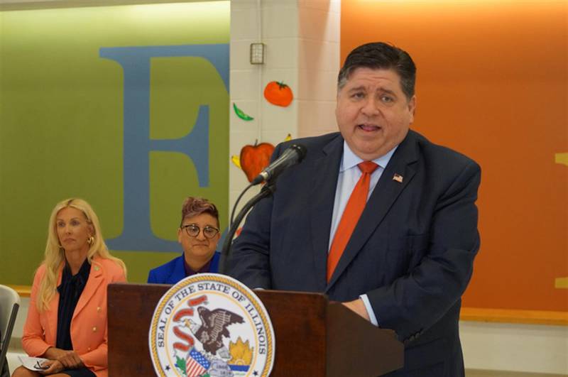 Gov. JB Pritzker announces the launch of a new summer nutrition program for school-age children during a news conference at Enos Elementary in Springfield.