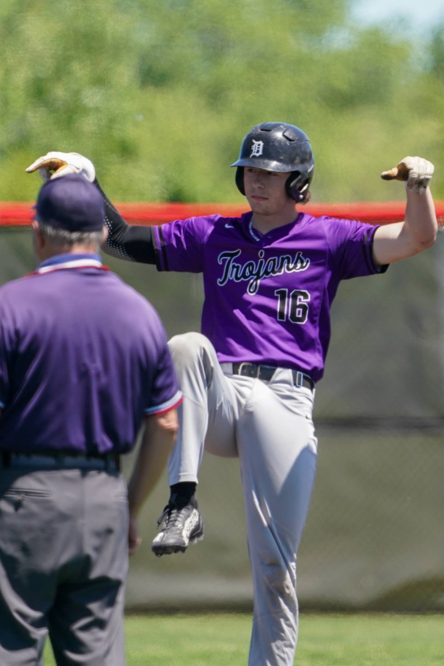 Downers Grove North's Jimmy Janicki (16) reacts after hitting a two run double against Oswego East during a 4A Bolingbrook Regional Championship baseball game at Bolingbrook High School on Saturday, May 25, 2024.