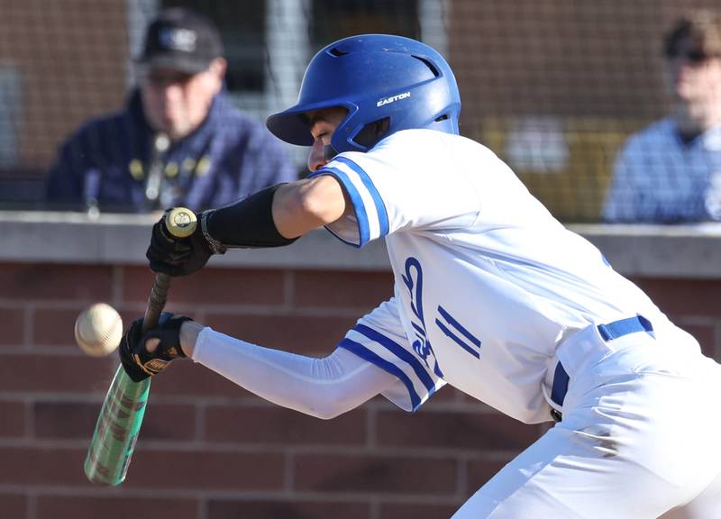 Hinckley-Big Rock’s Josh Badal tries to get a bunt down Monday, April 8, 2024, during their game against Newark at Hinckley-Big Rock High School.