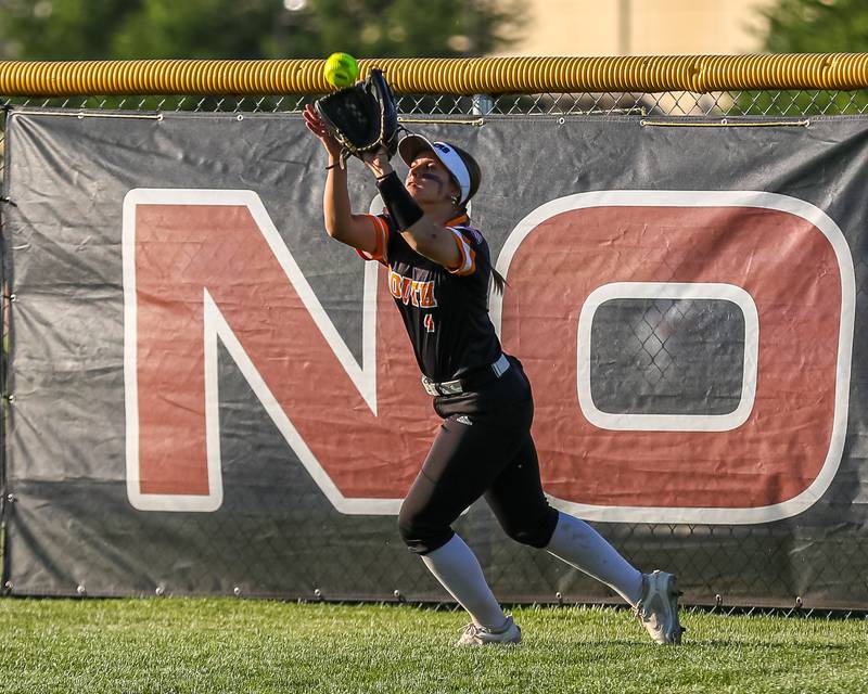 Wheaton-Warrenville South's Abby Mease (4) makes an outfield catch during Class 4A Plainfield North Sectional semifinal softball game between Wheaton-Warrenville South at Oswego. May 29th, 2024.