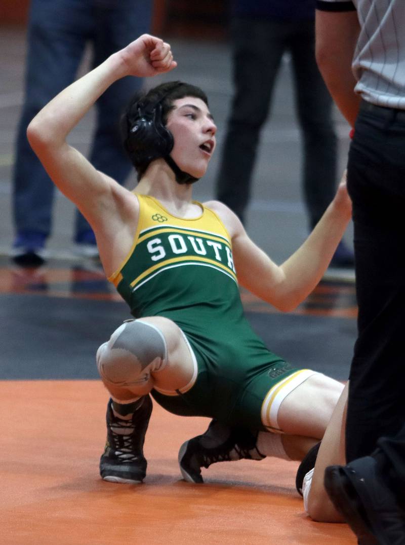 Crystal Lake South’s Glenn Donahue reacts after winning the third-place bout over Crystal Lake Central’s Nick Ng at 120 pounds during IHSA Class 2A regional wrestling at Crystal Lake Central Saturday.