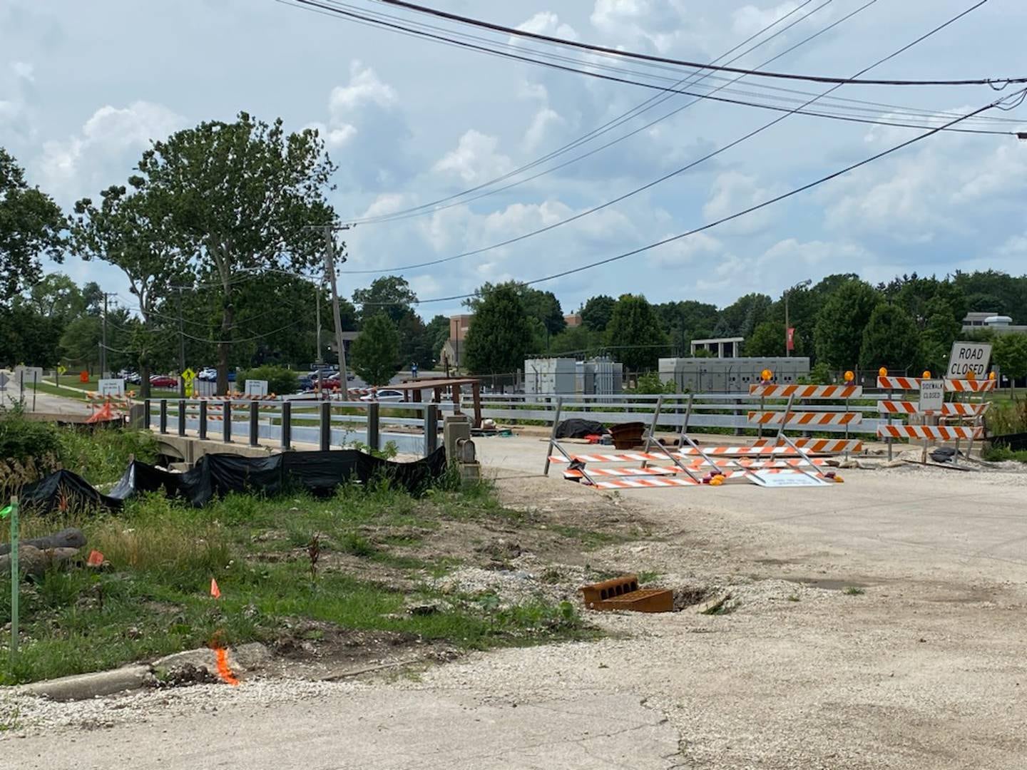 A portion of Lucinda Avenue is closed for bridge replacement in DeKalb on Thursday, July 6, 2023. The road near the bridge has been closed off since March 1, when crews began the process of replacing the bridge. DeKalb city officials said delays have pushed the completion date back from August to October 2023.