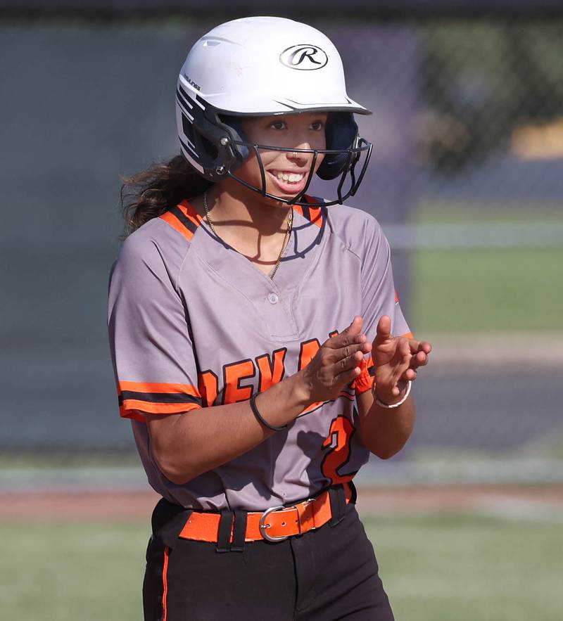 DeKalb's Nazeria  Dean claps after hitting a double down the left field line during their Class 4A regional semifinal game against Rockford Auburn Wednesday, May 22, 2024, at Hampshire High School.
