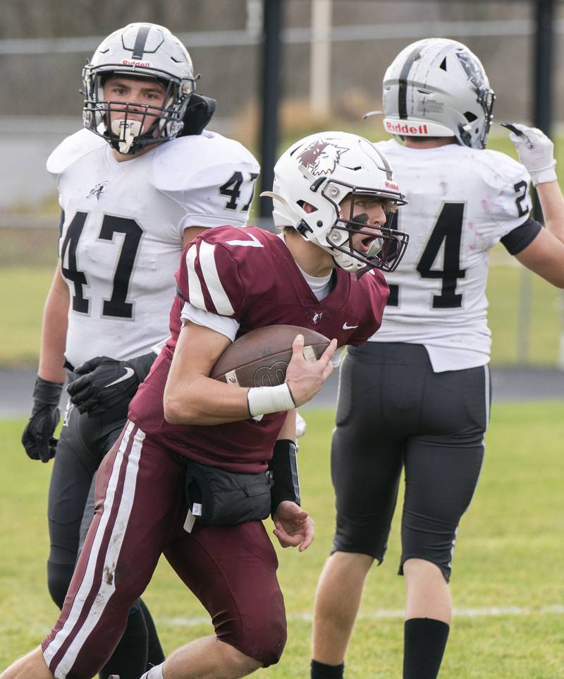 Prairie Ridge quaterback Tyler Vasey celebrates a touchdown against Kaneland during the 6A second-round football playoff game on Saturday, November 5, 2022 at Prairie Ridge High School in Crystal Lake. Prairie Ridge won 57-22.