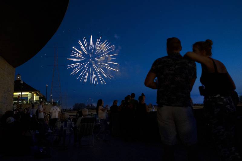 Spectators watch as fireworks illuminate the sky Monday, July 3, 2023 at Petunia Fest in Dixon. 90’s rock band Everclear finished off the weekend after the fireworks with a show on the main stage in downtown Dixon.