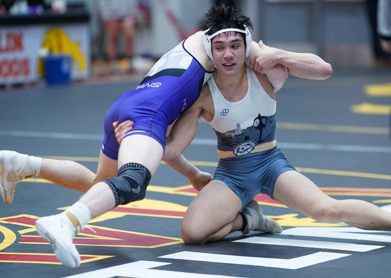 Lemont’s Noah O`Connor shoots the leg of Hononegah’s Max Haskins In a 150-pound championship match during The Clint Arlis Invitational Wrestling meet at Batavia High School in Batavia on Saturday, Jan 13, 2024.