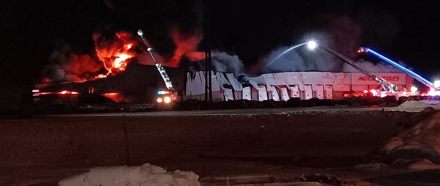 Firefighters are on scene in subzero temperatures battling a massive fire that has destroyed Moore Tires, 2411 E. Rock Falls Road/U.S. Route 30.
