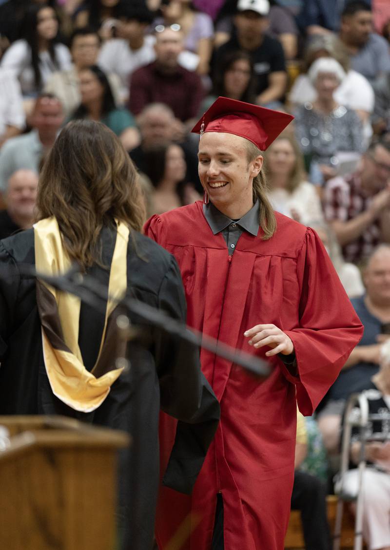 Quinn Baker receives his diploma Sunday, May 19, 2024, at Streator High School.