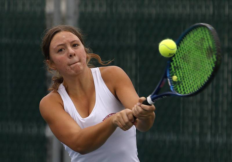 Marian Central’s Kaitlyn Remke returns the ball Thursday, Oct. 19, 2023, during the first day of the IHSA State Girls Tennis Tournament at Hersey High School in Arlington Heights.