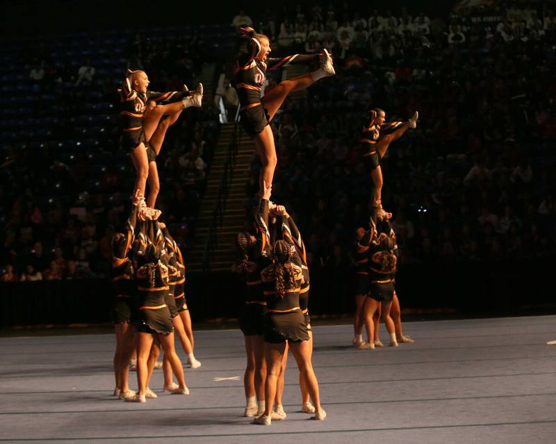 Members of the Lincoln-Way West High School cheer team perform during the IHSA Cheer State Finals in Grossinger Motors Arena on Saturday, Feb. 4, 2023 in Bloomington.