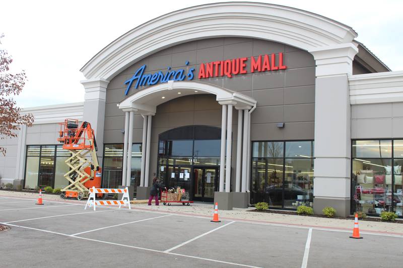 A vendor loads in items at America's Antique Mall in Algonquin. The grand opening of the mall is set for Nov. 24.