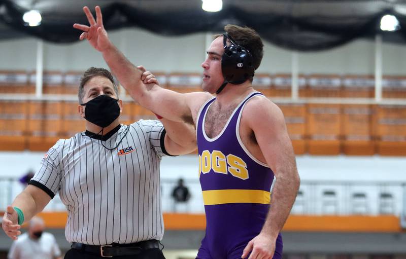 Wauconda’s Nick Bennett won over Crystal Lake South’s Dom Ariola in a 170-pound bout during IHSA Class 2A regional wrestling at Crystal Lake Central Saturday.