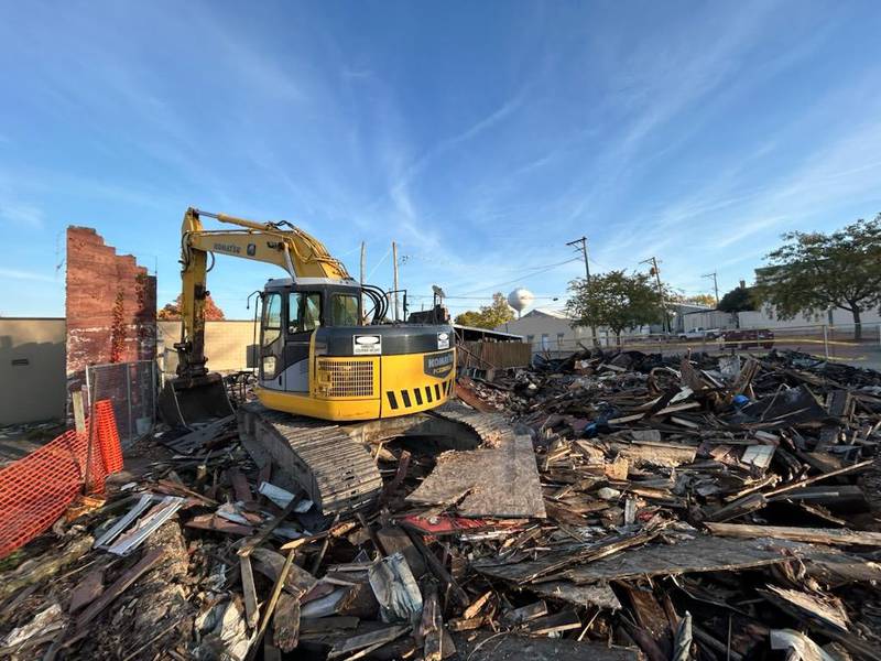 The structure at 1 Wesley Ave., Mount Morris, which was one of two buildings destroyed in an April 16 fire, was demolished Monday.