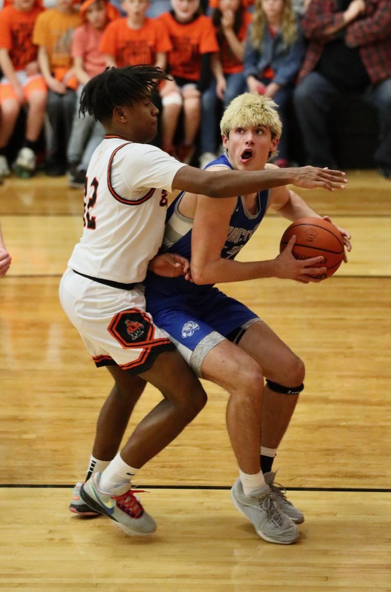 Princeton's Noah LaPorte posts up against Kewanee's Braydon Conley Tuesday night.