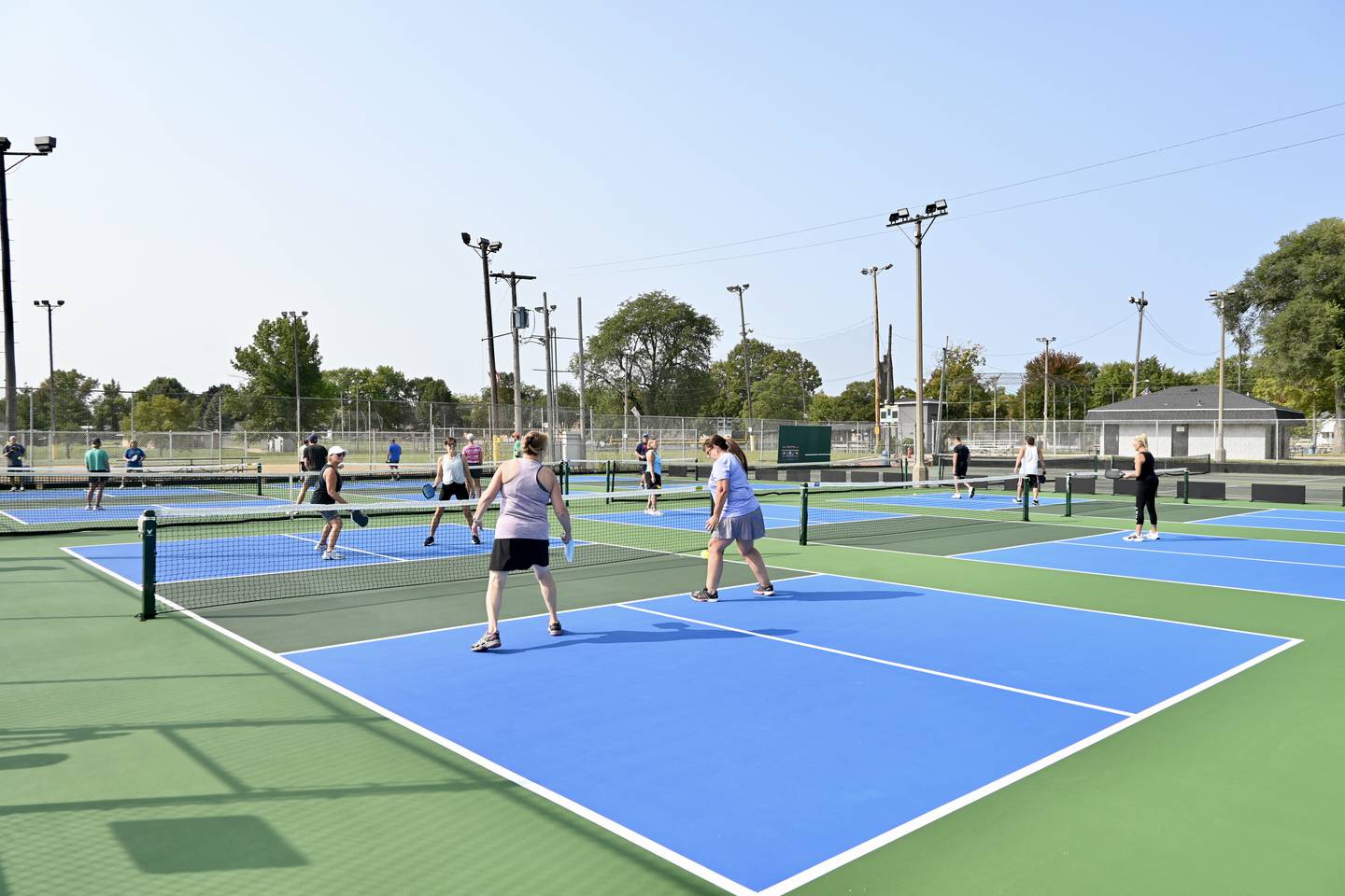 Players enjoy the new pickleball courts at Hegeler Park in La Salle on Wednesday, Sept. 11, 2024.