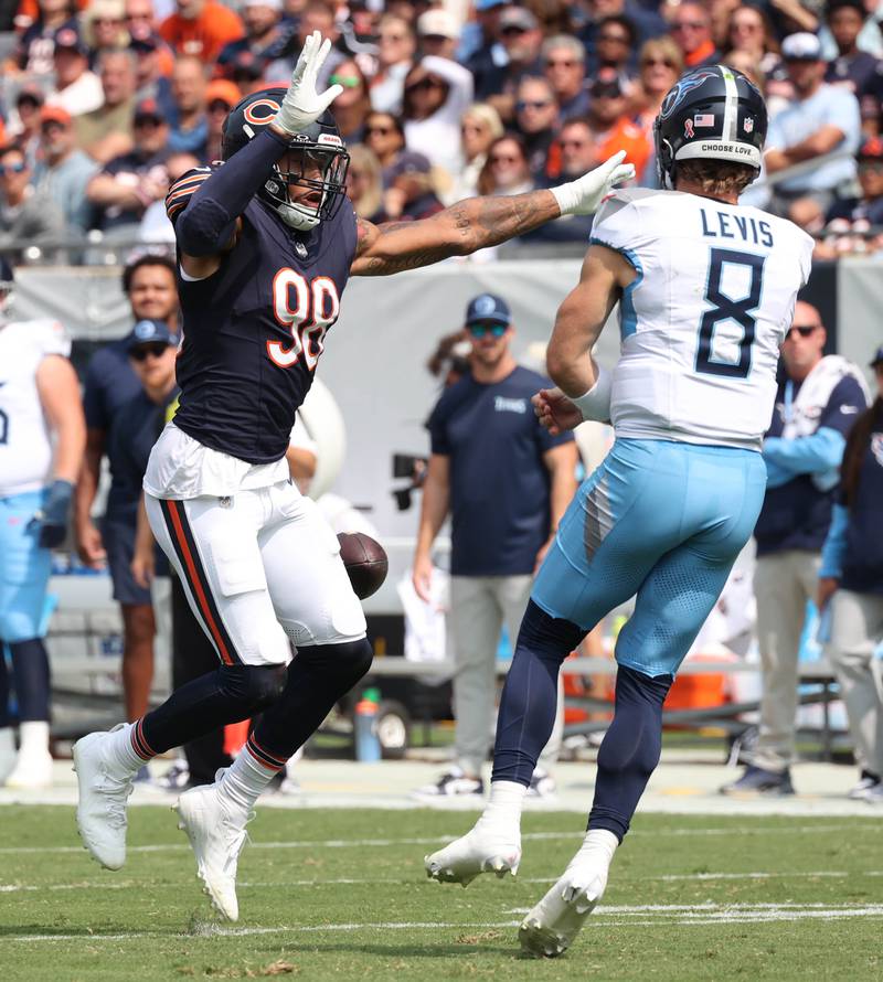 Chicago Bears defensive end Montez Sweat forces Tennessee Titans quarterback Will Levis to throw the ball away during their game Sunday, Sept. 8, 2024, at Soldier Field in Chicago.