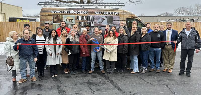 Michael Minch, owner of Creative Custom Interiors, cuts the ribbon as part of his celebration of being in the community since 2017.  Michael is joined by some of his clients, friends, and the staff and board of the Cary-Grove Grove Area Chamber of Commerce