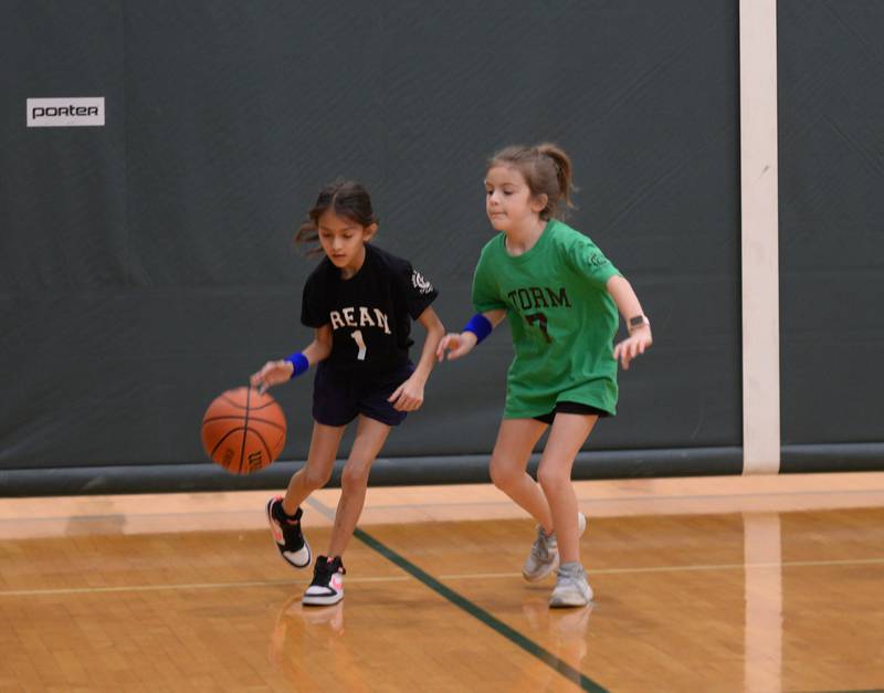 (left) Julieta Uribe and Aubrey Alfaro participate in Youth Basketball held at the LaGrange Park District Saturday, Jan 6, 2024.