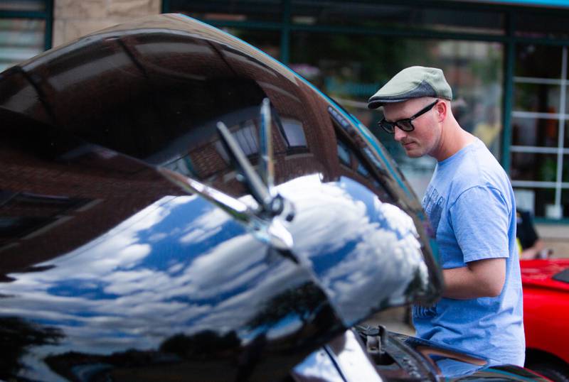 John Lancaster of Itasca looks at the interior of a 1950 Packard during Cruisin’ Night in downtown Westmont on Thursday, June 6, 2024.

Suzanne Tennant/ For Shaw Local News Media