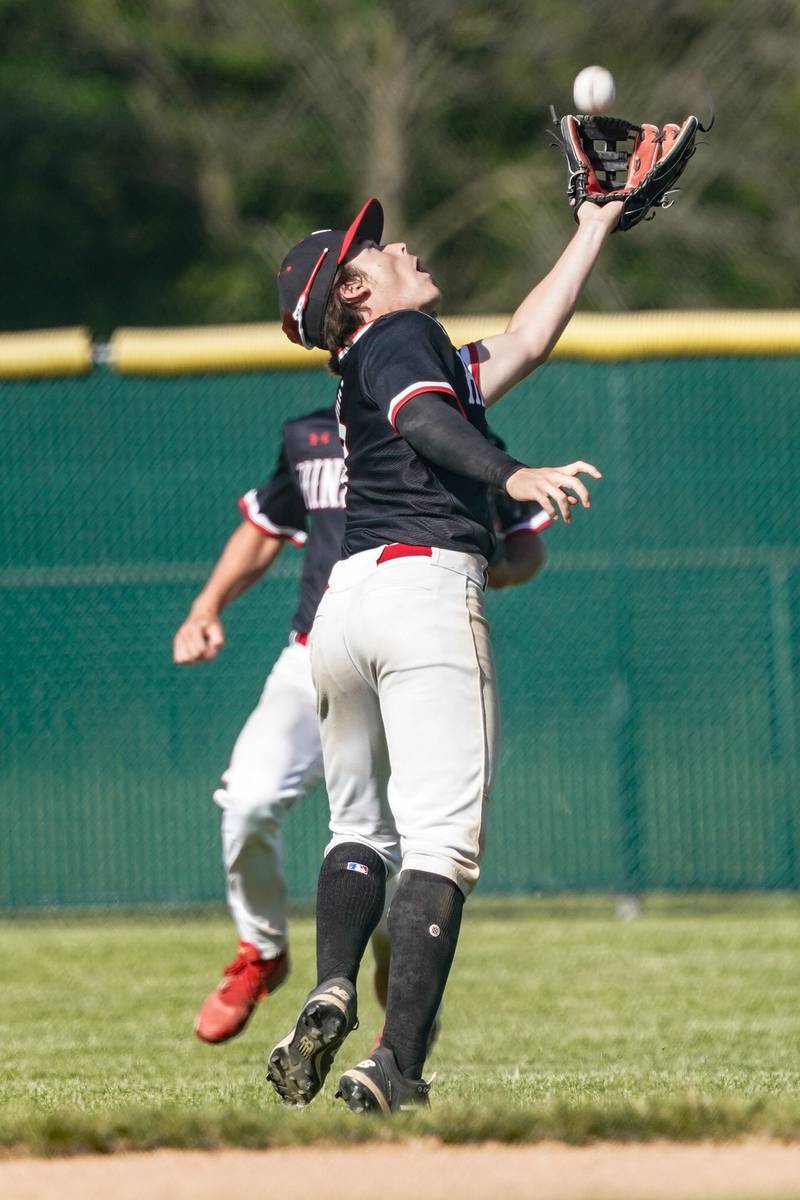 Hinsdale Central's Luke Jurack (9) catches a fly-ball for an out during a Class 4A Waubonsie Valley Regional semifinal baseball game against Oswego at Waubonsie Valley High School in Aurora on Wednesday, May 22, 2024.