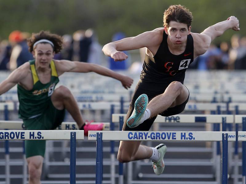 Crystal Lake Central Jonathan Tegel competes in the 110 meter hurdles Friday, April 21, 2023, during the McHenry County Track and Field Meet at Cary-Grove High School.