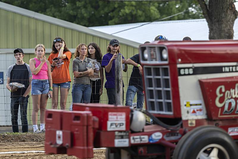 “Earl’s Dream” driven by David Runkle fires past watchers Wednesday, August 9, 2023 at the Carroll County fair. Runkle took the light limited super stock win.