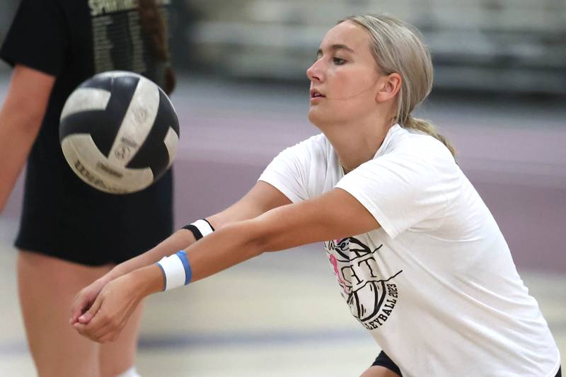 Lana Walker bumps the ball during a drill at Sycamore High School volleyball camp Tuesday, July 23, 2024, at Sycamore High School.