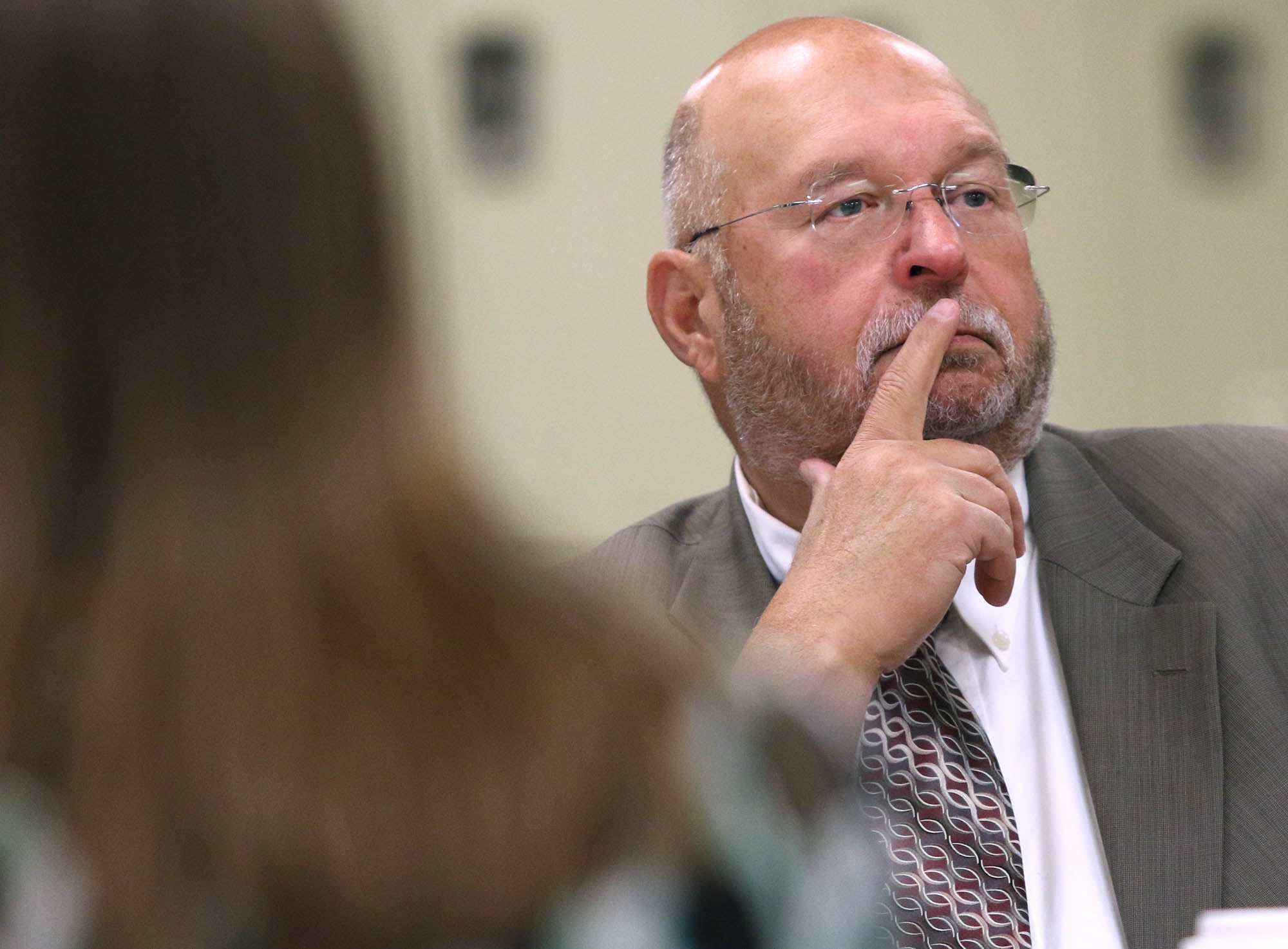 Shaw Local 2018 file photo – Sycamore School District 427 Board President  Jim Dombek listens as Nicole Stuckert, District 427 chief financial officer, talks about the 2018 tax levy at the board meeting Tuesday at Sycamore Middle School.