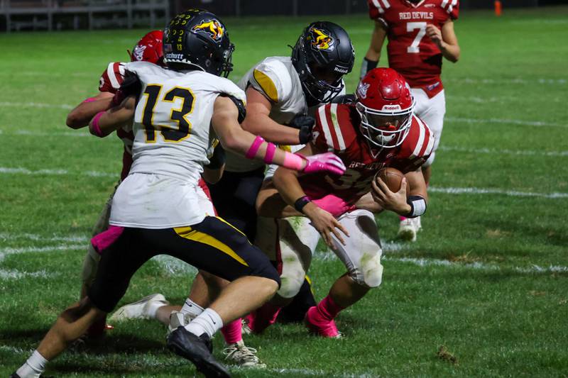 Aiden Redcliff of Hall runs ball whilst being tackled by Riverdale on Friday, October 18, 2024 at Richard Nesti Stadium in Spring Valley.