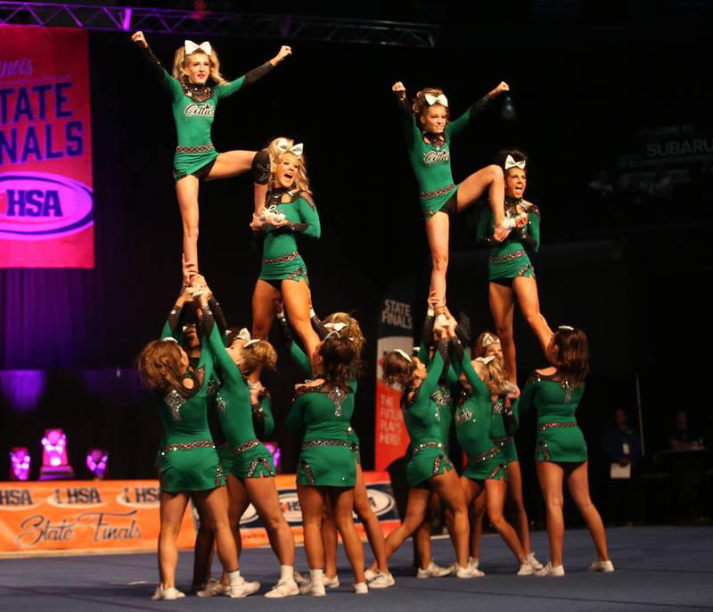 Members of the Providence Catholic cheer team perform during the IHSA Cheer State Finals in Grossinger Motors Arena on Saturday, Feb. 4, 2023 in Bloomington.