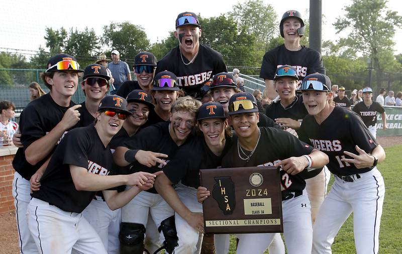 Crystal Lake Central players celebrate their 6-2 win over Deerfield in the Class 3A Grayslake Central sectional championship baseball game on Friday, May 31, 2024, at the Grayslake Central High School.