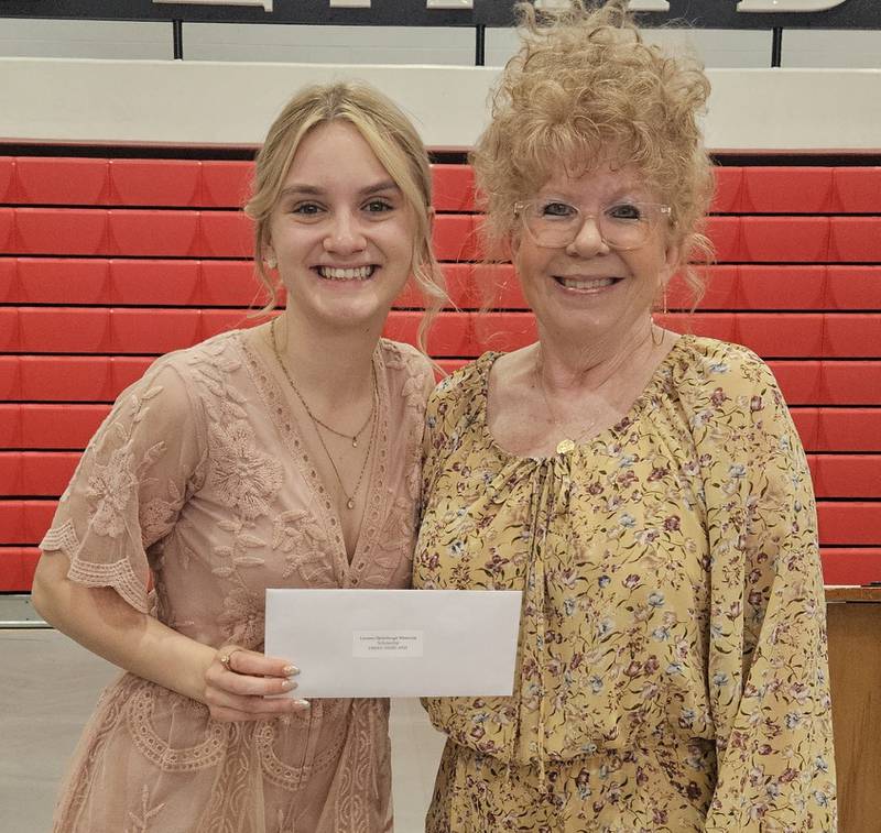 Lori Miller presented the LaVerne Defenbaugh Scholarship to Emma Highland.