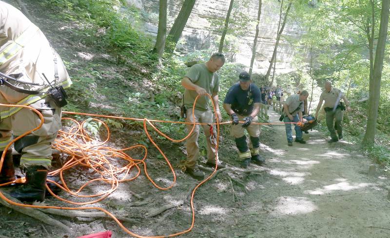 Oglesby and Utica Fire and EMS conduct a rope rescue for a male subject who fell at La Salle Canyon on Wednesday, July 17, 2024 at Starved Rock State Park.