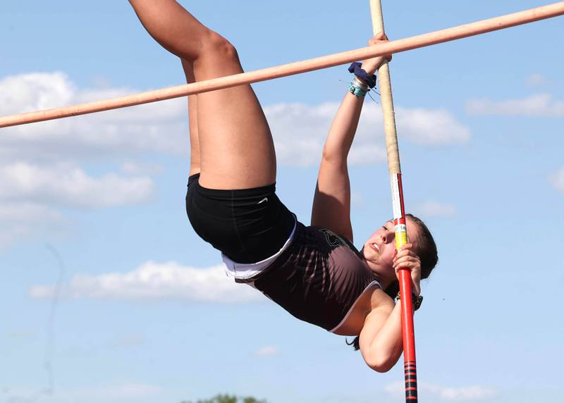 Sycamore’s Kaitlyn Lisafeld clears the bar in the pole vault Wednesday, May 8, 2024, during the girls track Class 2A sectional at Rochelle High School.
