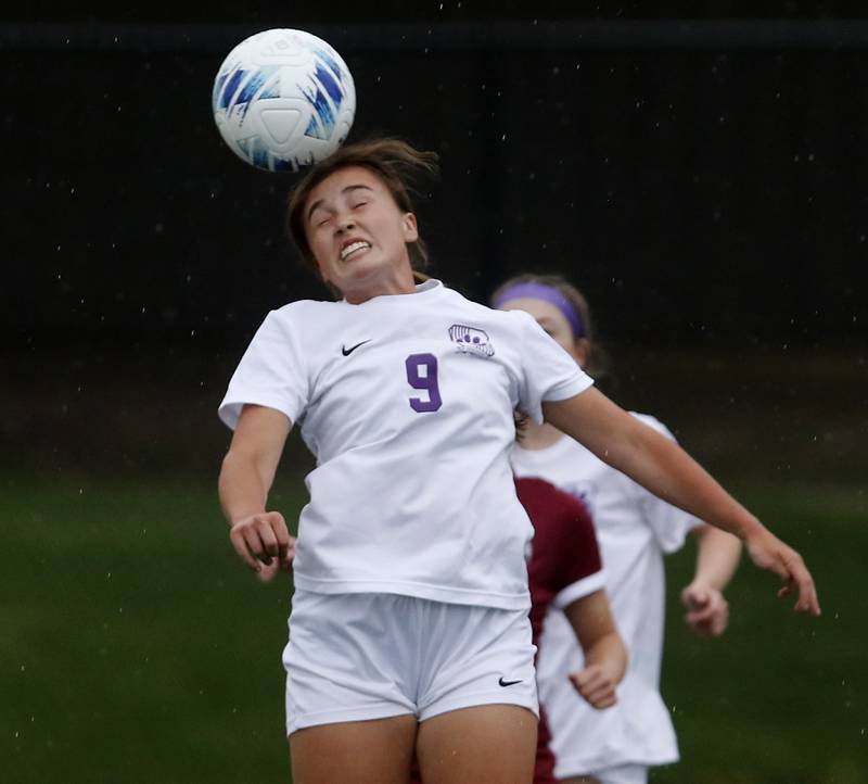 Hampshire's Isabel Morales heads the ball during a Fox Valley Conference soccer game against Prairie Ridge on Tuesday, April 16, 2024, at the MAC Athletic Complex in Crystal Lake.