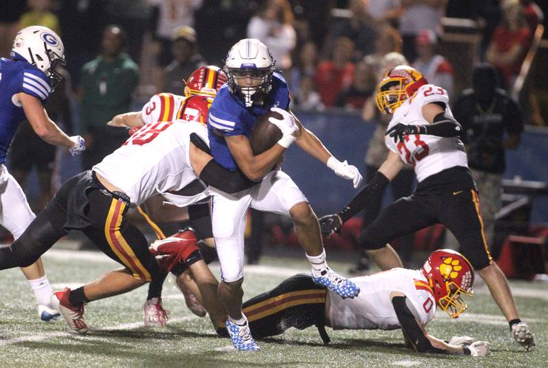 Geneva’s Talyn Taylor gets wrapped up by Batavia’s defense during a game at Geneva during the 2023 season.