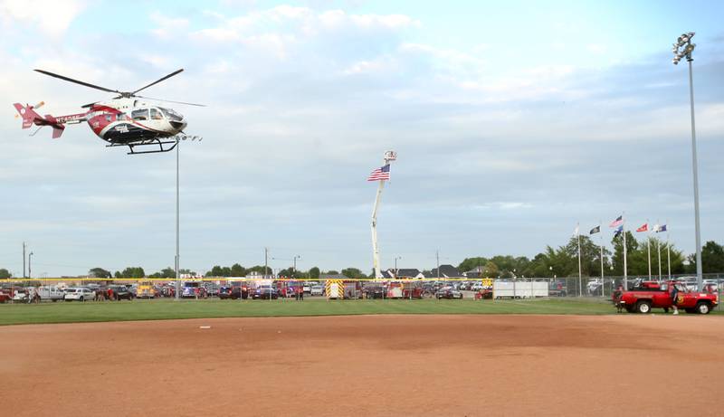 OSF Lifeflight helicopter departs Veterans Park during first responder night at the Illinois Valley Pistol Shrimp game on Tuesday, June 11, 2024 in Peru.