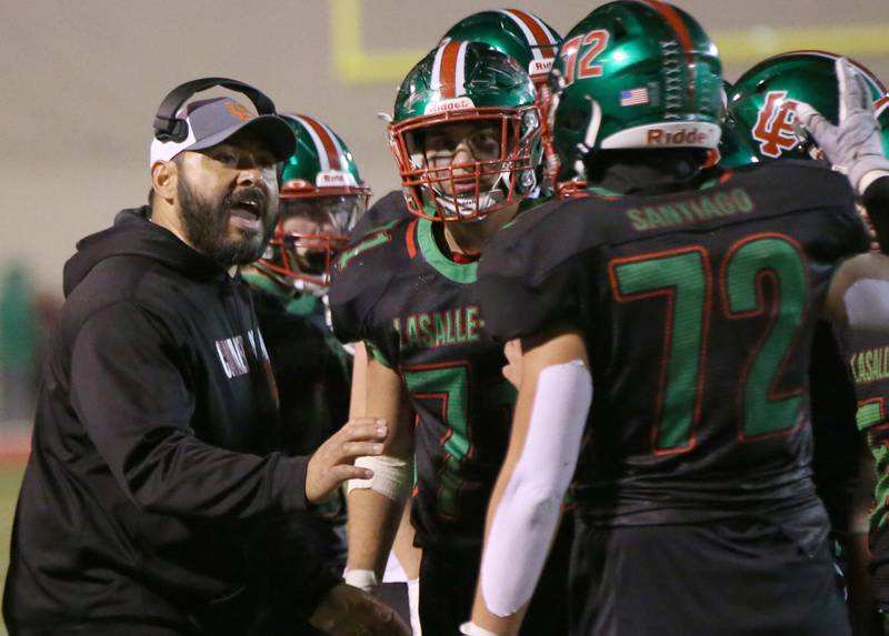 L-P head coach Jose Medina talks to his team during a timeout against Ottawa on Friday, Oct. 6, 2023 at Howard Fellows Stadium.