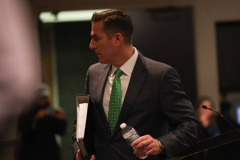 Inspector General Sean Connolly leaves the podium after speaking on conspiracy allegations against Joliet Mayor Bob O’DeKirk during the City Council Meeting at City Hall in Joliet on Monday, March 13th, 2023.