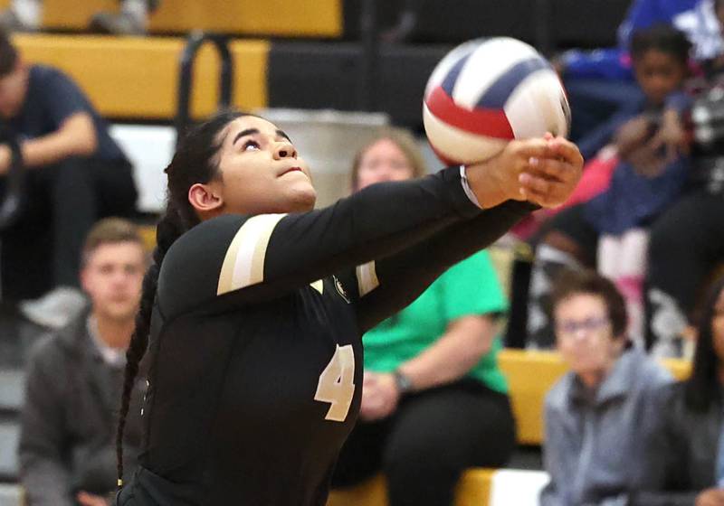 Sycamore's Hatie-Jane Alexander bumps the ball during their match Tuesday, Oct. 10, 2023, at Sycamore High School.