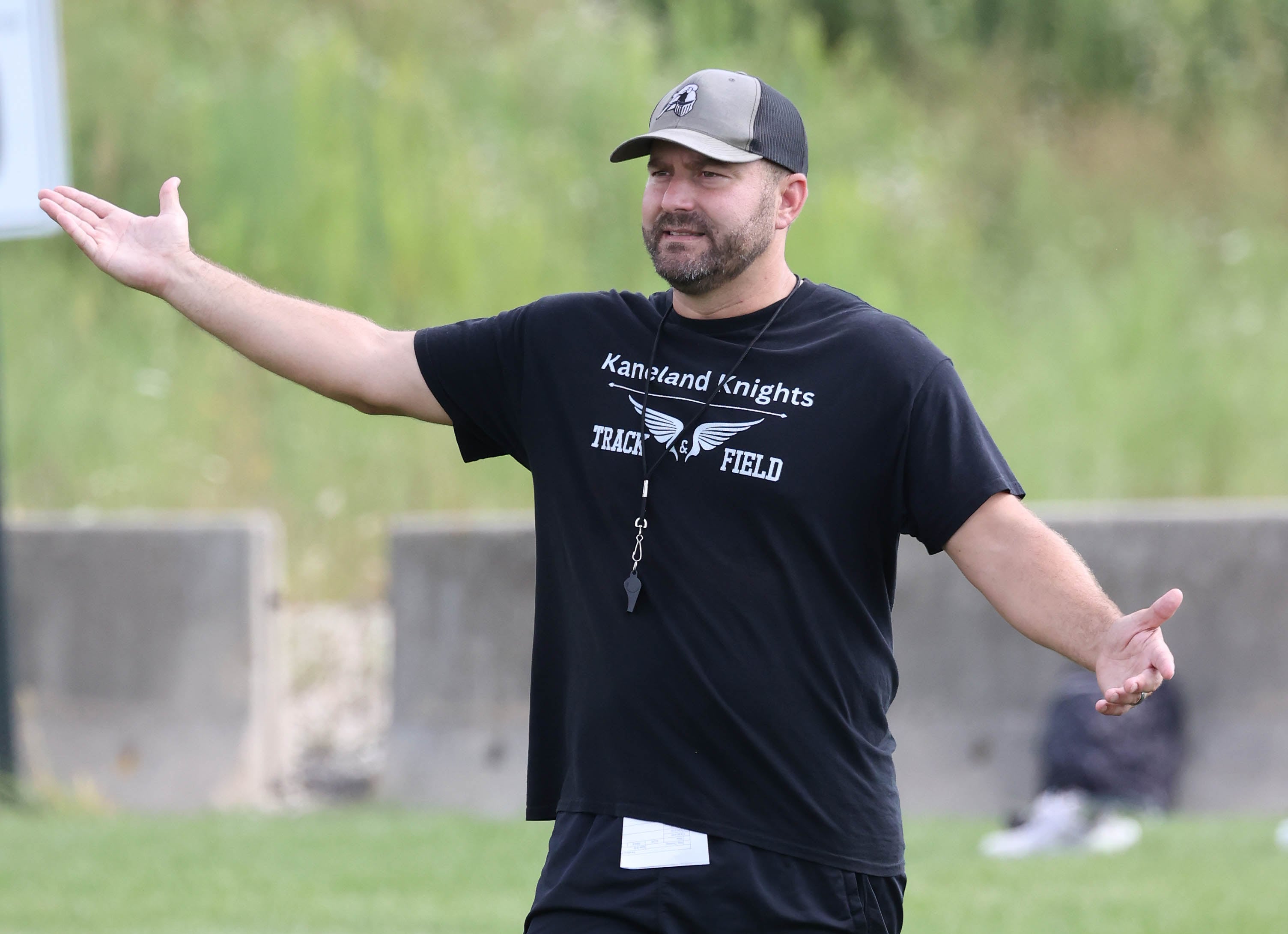 Kaneland football head coach Michael Thorgesen talks to his team during practice Friday, Aug. 16, 2024, at the school in Maple Park.