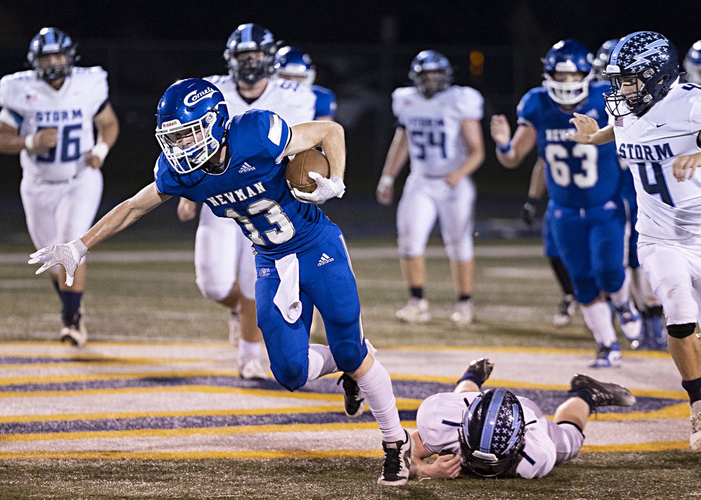 Newman’s Mac Hanrahan avoids a tackle against Bureau Valley Friday, Sept. 29, 2023 in Sterling.