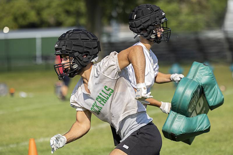 Rock Falls’ Issac Duchy makes a move while practicing Tuesday, Aug. 13, 2024 for the upcoming football season.