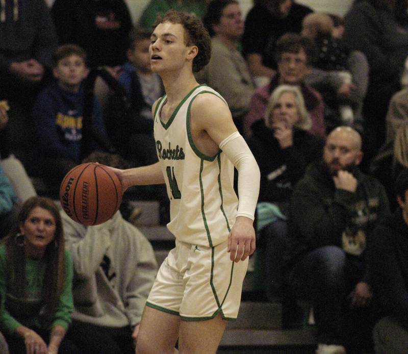 Rock Falls' Gavin Sands eyes the Dixon defense during their game Tuesday, Feb. 6, 2024, at Rock Falls High School.