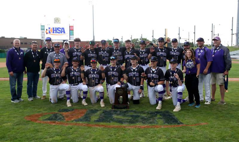 Members of the Wilmington baseball team pose with the Class 2A third place trophy on Saturday, June 1, 2024 at Dozer Park in Peoria.