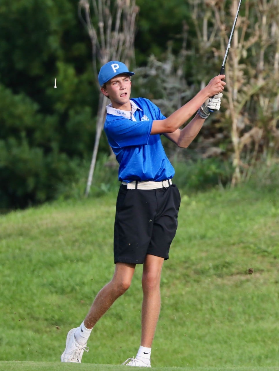 Princeton's jackson Mason watches his shot Monday at Wyaton Hills Golf Course in Princeton.